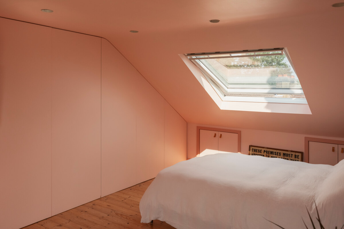 attic bedroom storage under slanted ceiling
