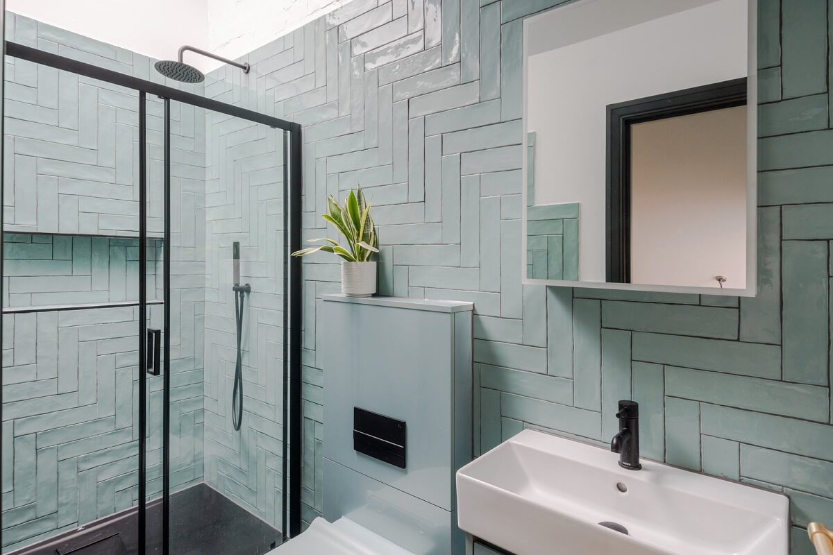 bathroom light blue tiles skylight
