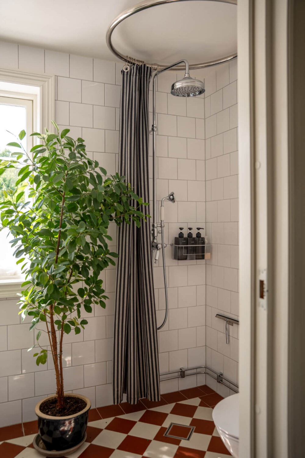 bathroom red and white checkerboard floor tiles