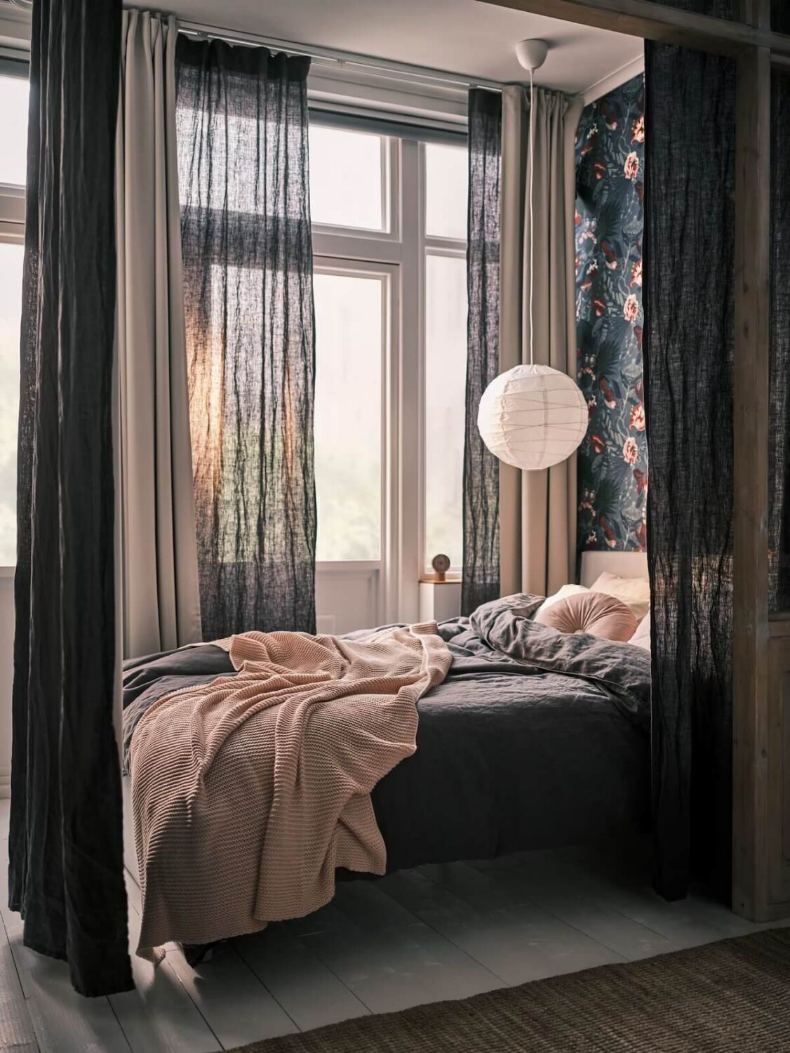 bedroom with dark floral wallpaper