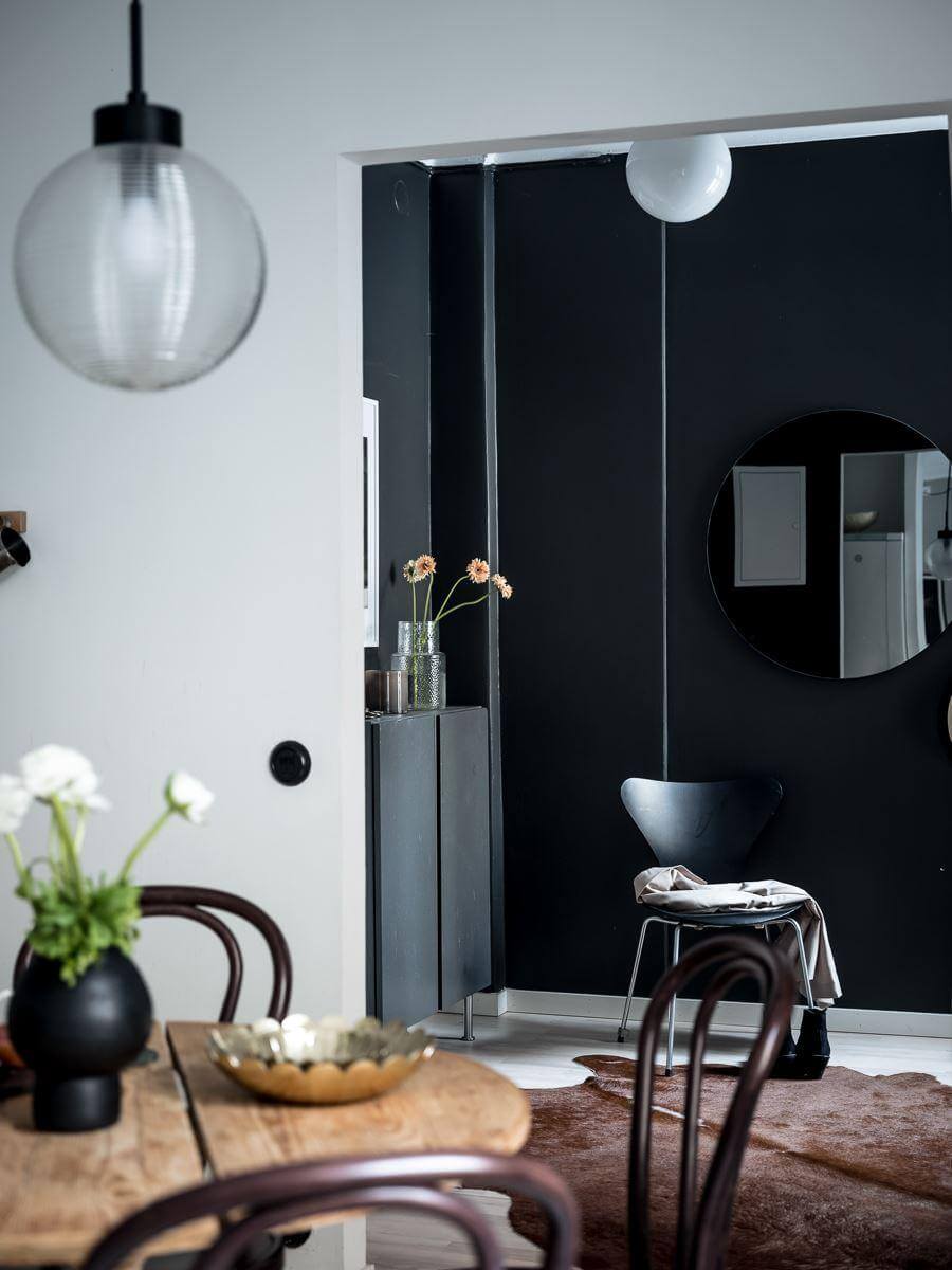 black feature wall hallway studio apartment