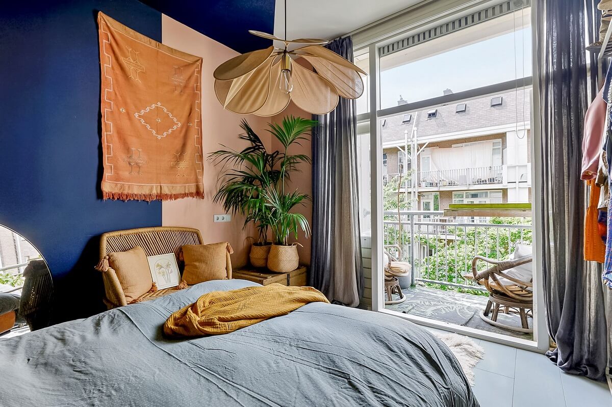 blue bedroom with balcony