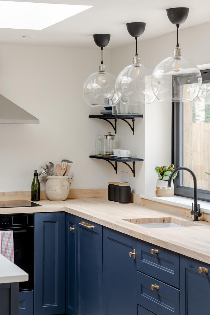blue kitchen with black fittings nordroom