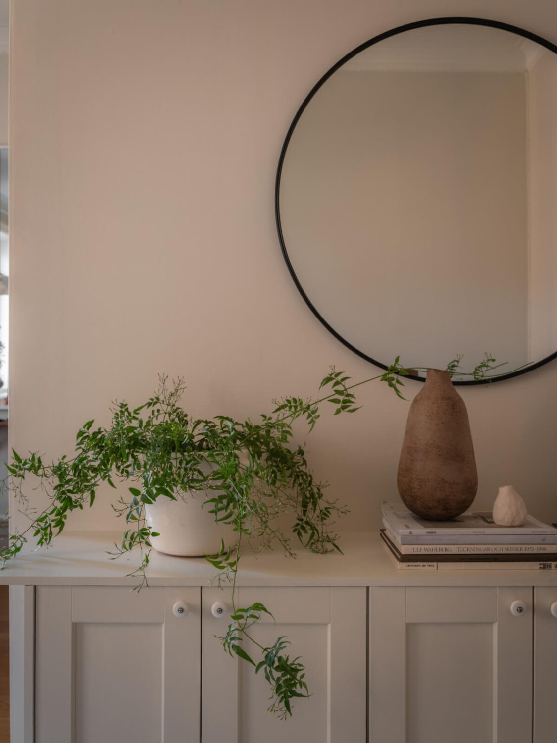 cabinets round mirror