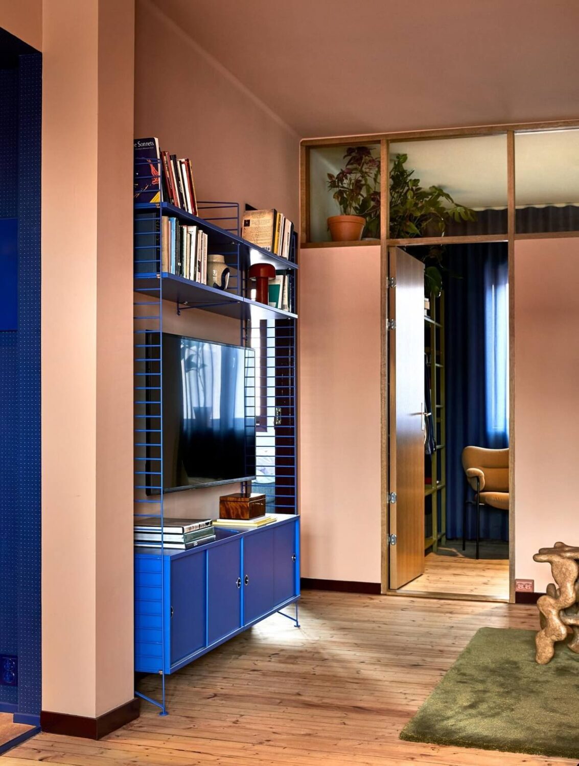color drenched living room with blue shelves cabinet nordroom Trend Alert: 36x Color-Drenched Rooms