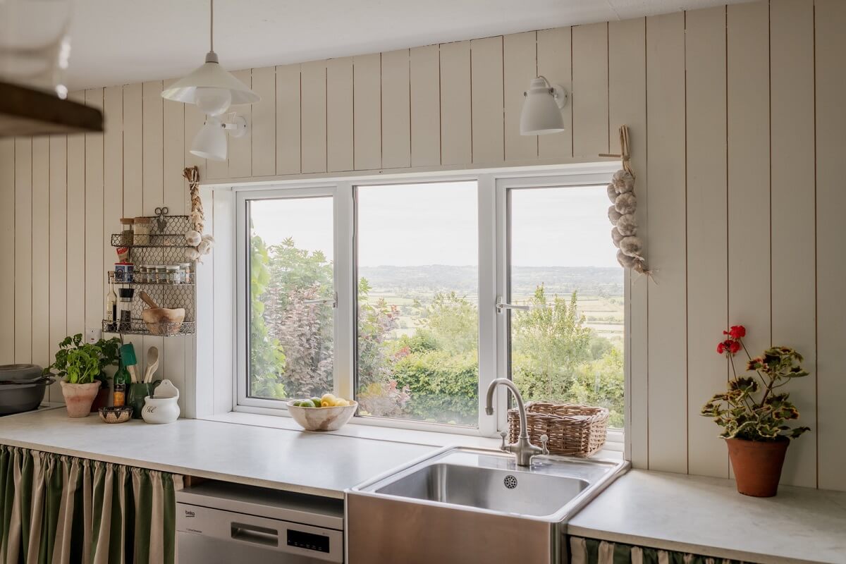 cottage kitchen with wooden walls