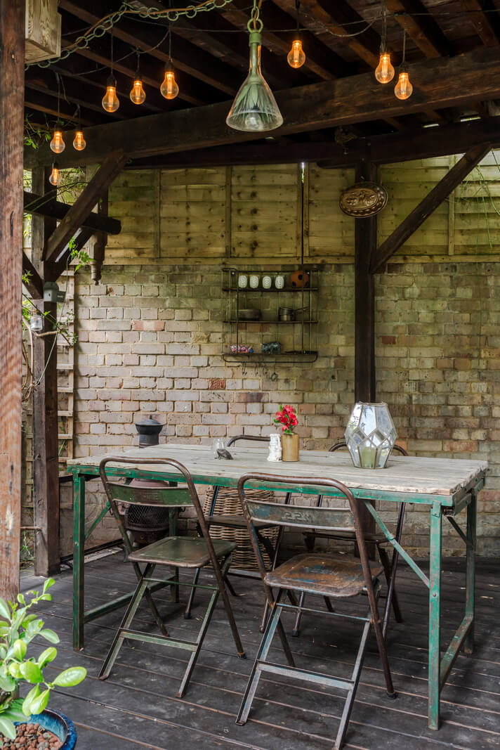 covered garden seating london home A Victorian Home with a Rich Color Palette and a Beautiful Garden