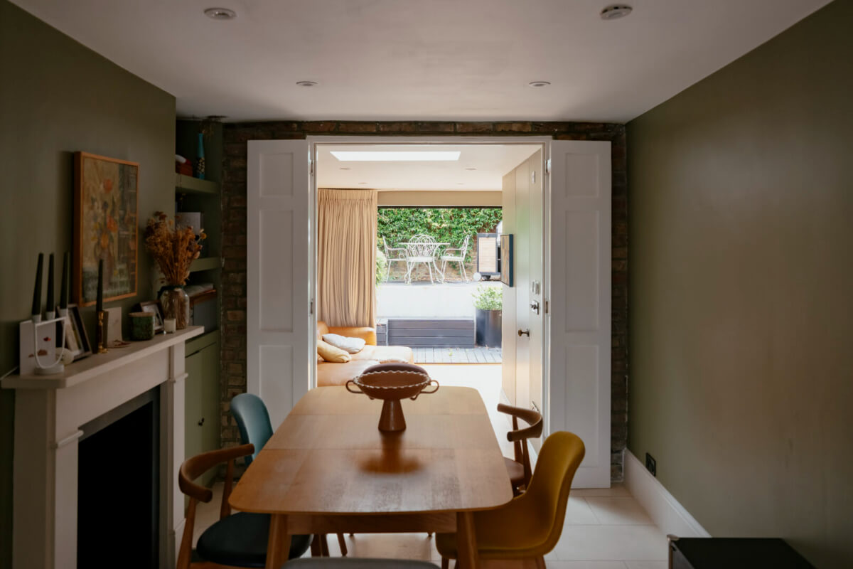 dining room with double doors to sitting room