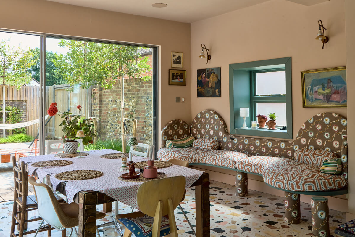 dining space with curved built-in bench