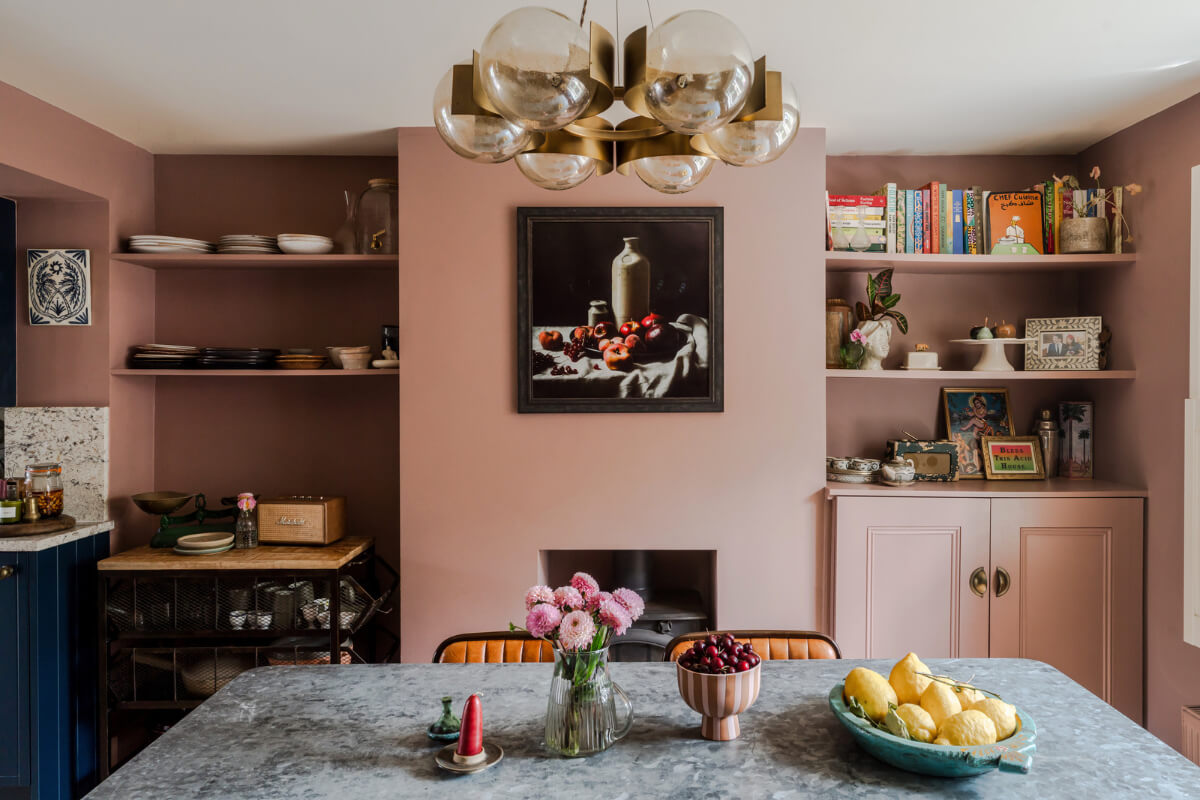 earthy pink dining room built-in shelves
