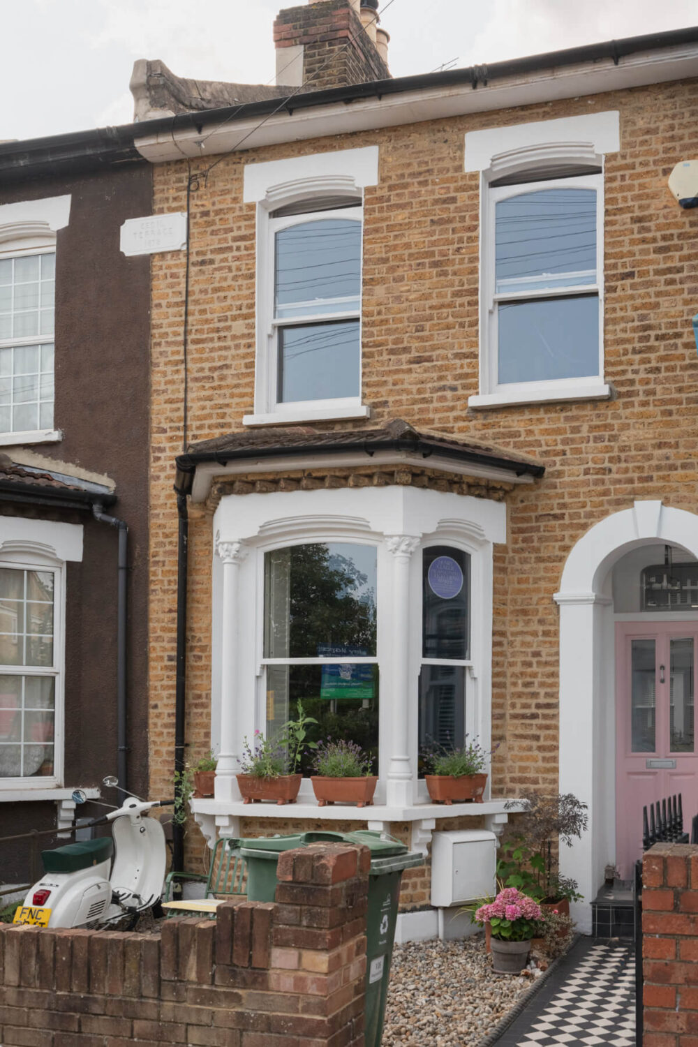exterior pink front door Exposed Brick and Wooden Beams in an Extended London Home