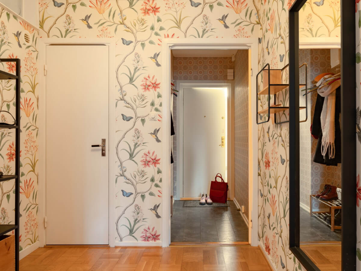 floral bird wallpaper hall A Light Corner Apartment with a Pale Yellow Kitchen
