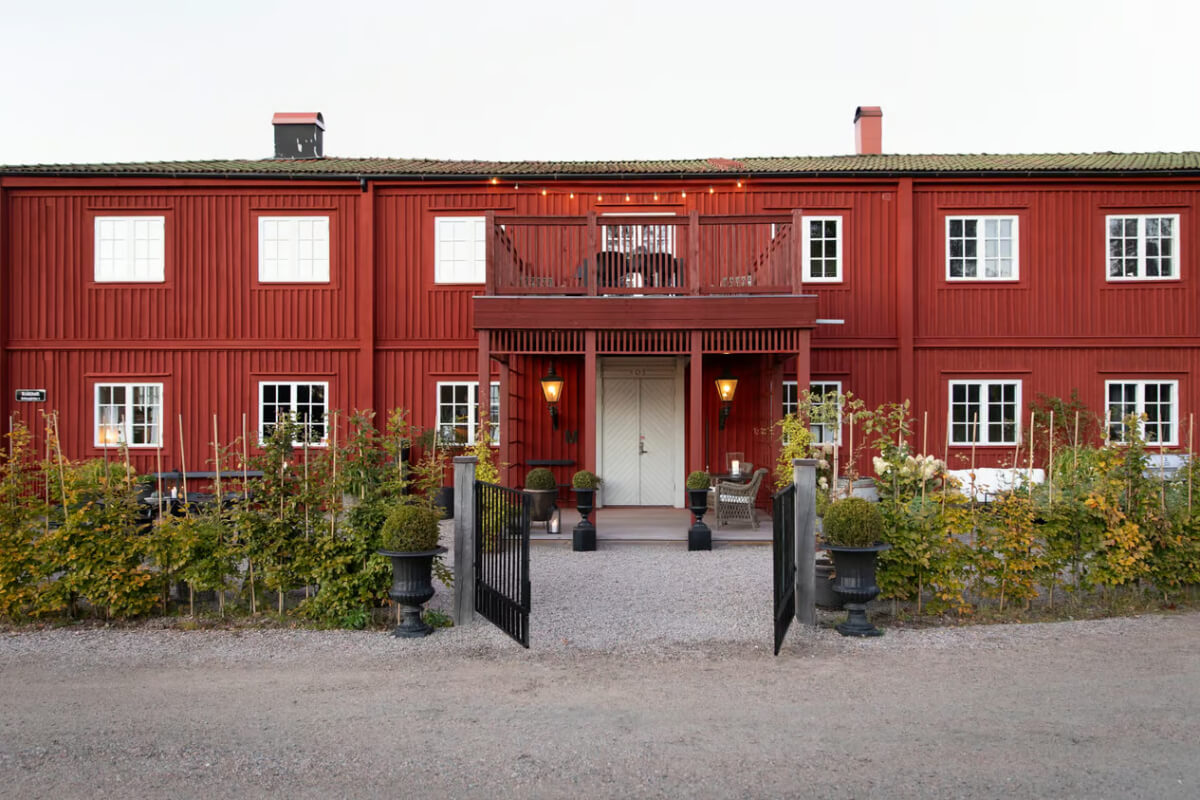 front door red factory conversion sweden An Open-Plan Gray Home in a Former Textile Factory