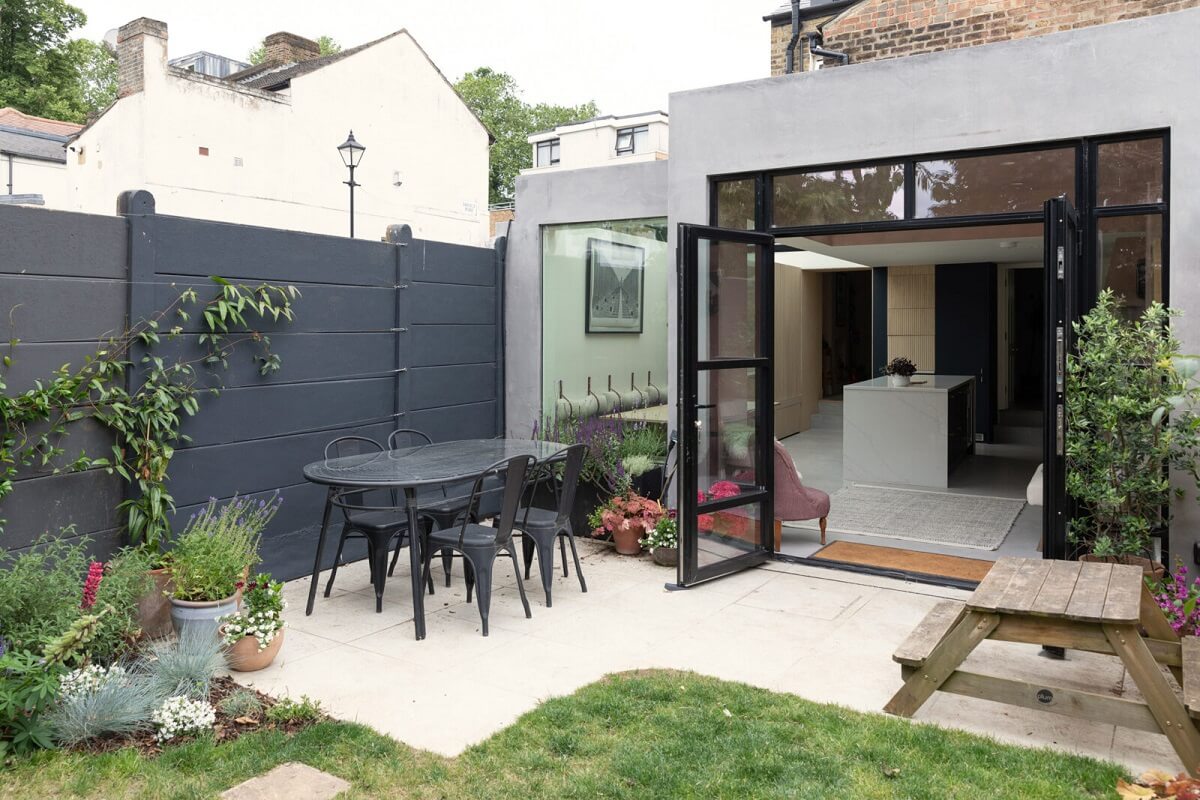 garden dining table with glass doors to kitchen nordroom