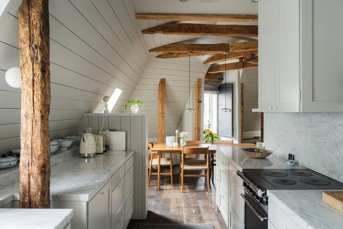 gray kitchen dining space wooden beams
