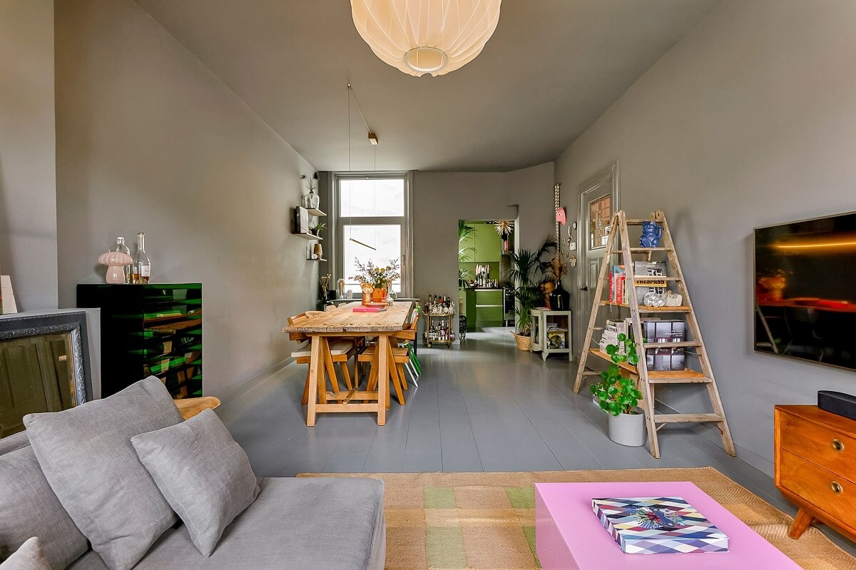 gray living room with dining table
