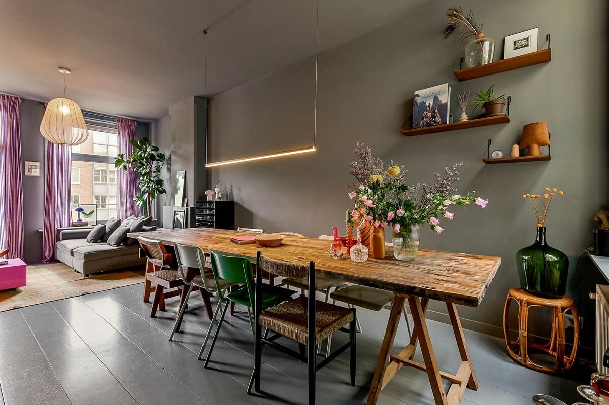gray living room with large wooden dining table