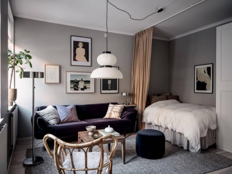 gray scandinavian studio apartment purple sofa curtain room divider nordroom