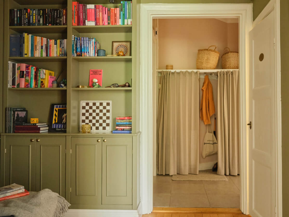 green built-in bookshelves