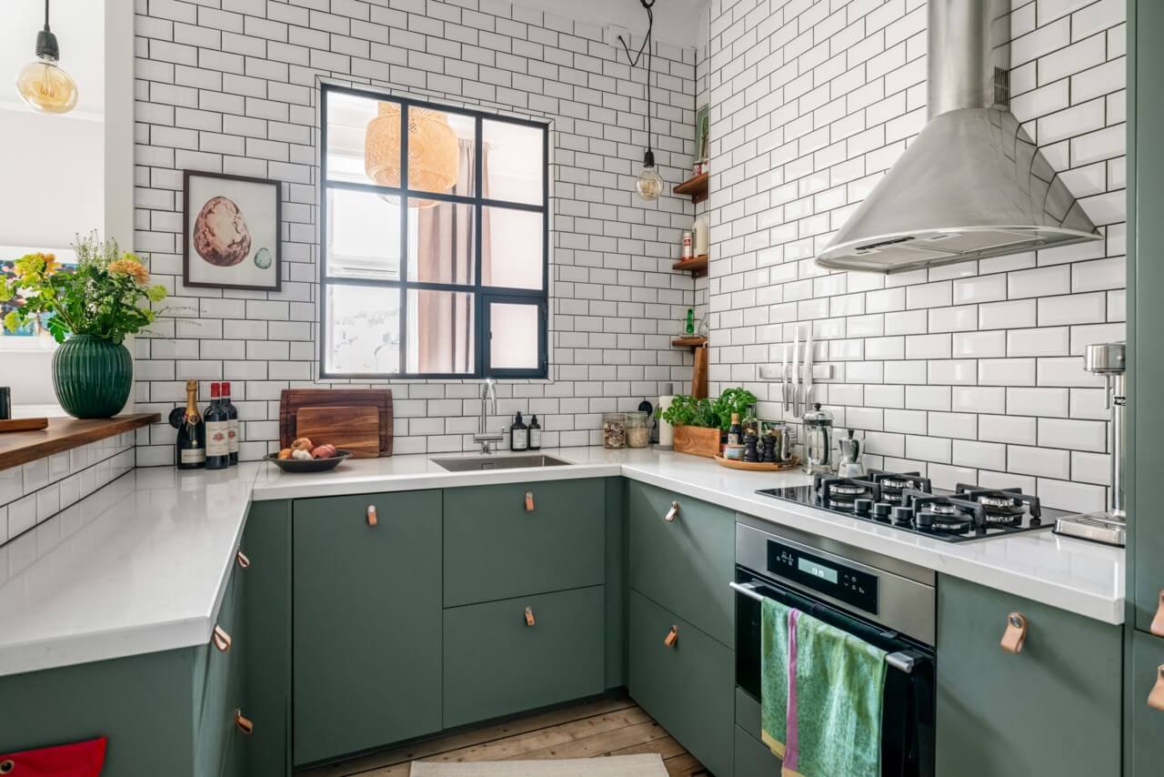 green kitchen leather handles white subway tiles