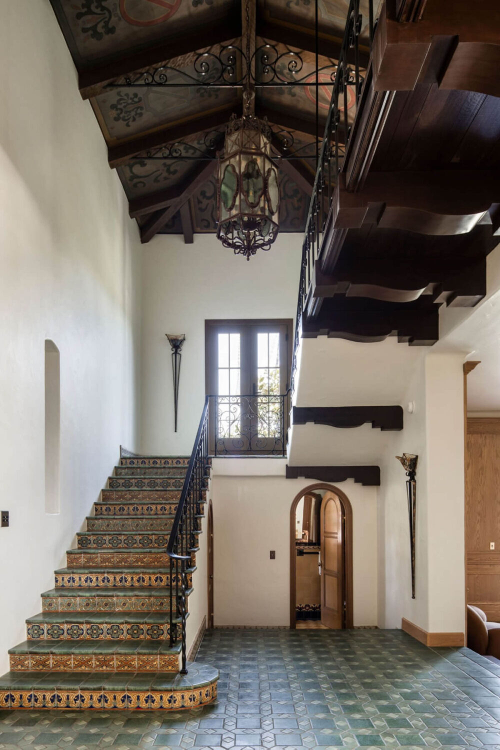 hall ornate wooden ceiling tiled stairs