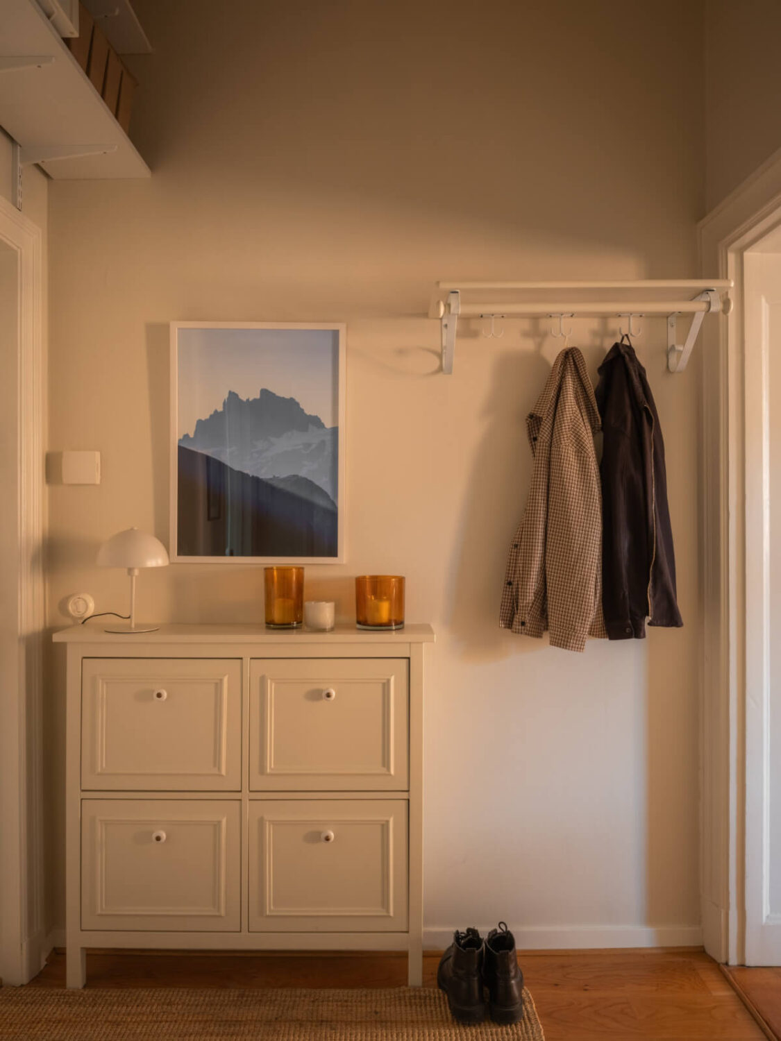 hall shelves above door A 19th Century Apartment with a Dark Glass Room Divider