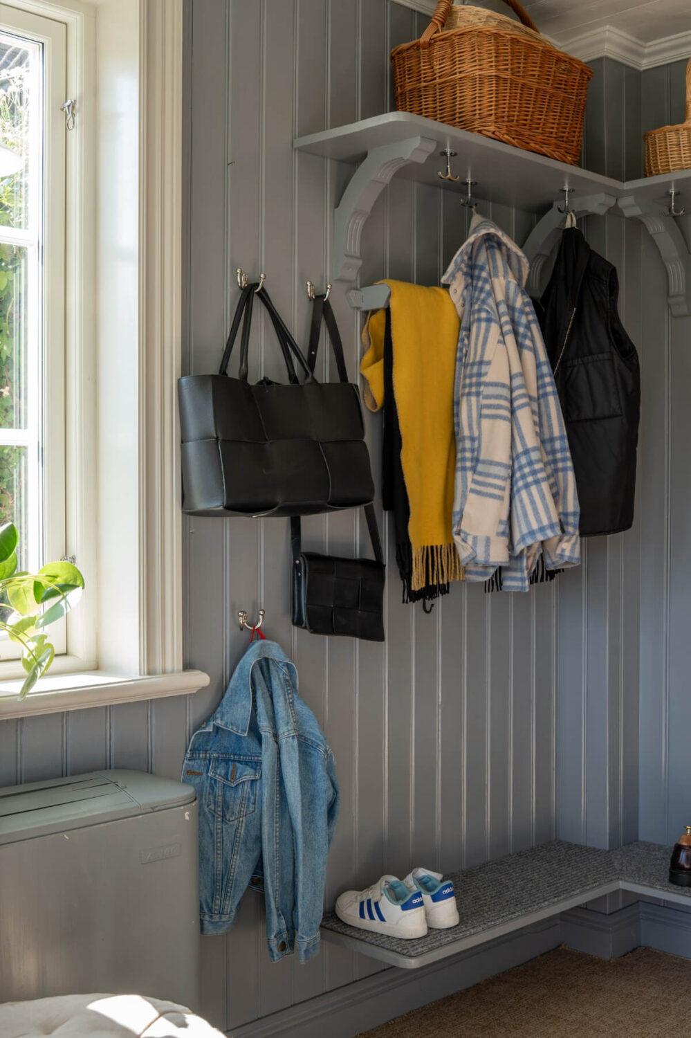 hall with coat and shoe storage