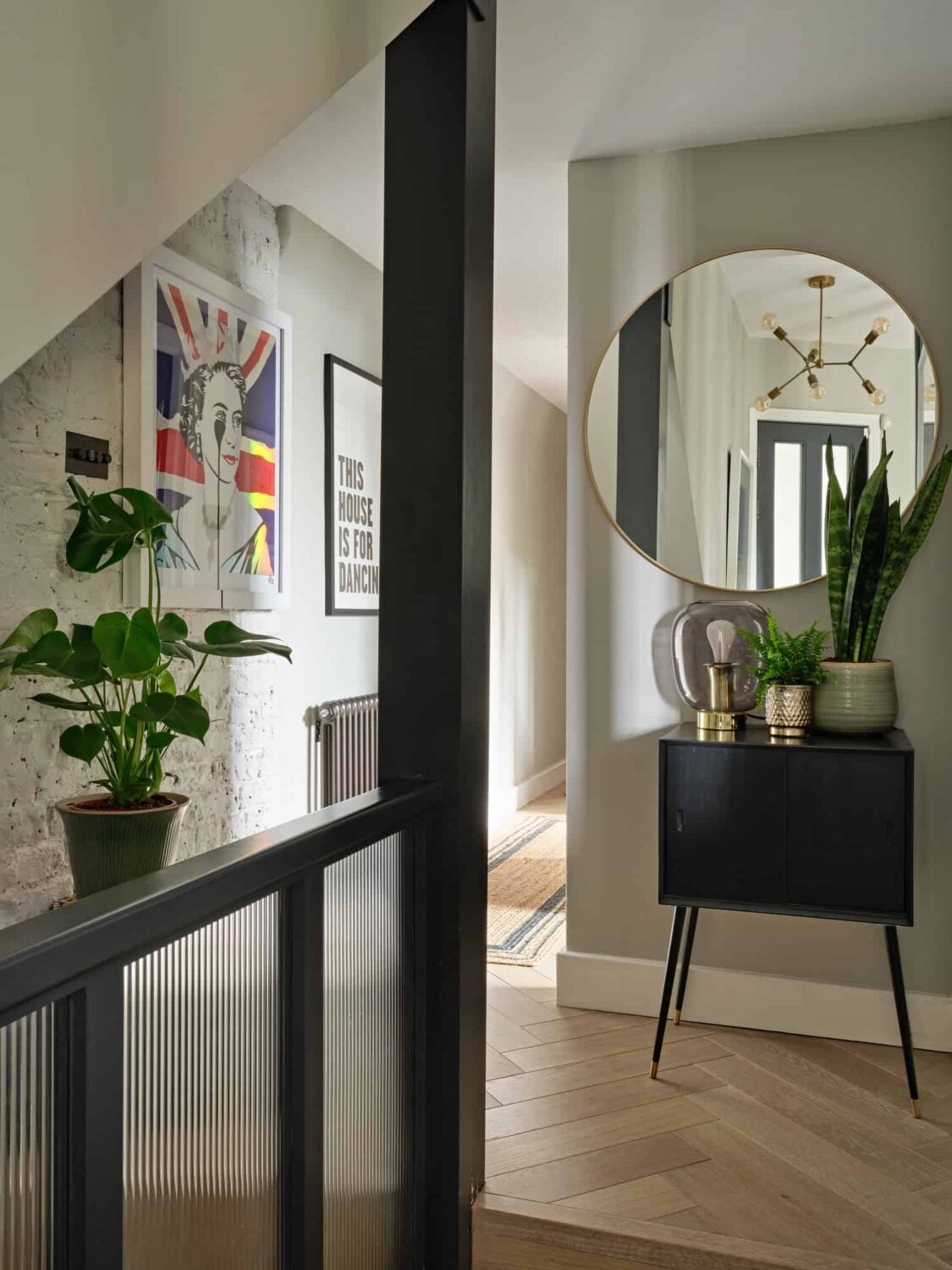 hallway with round mirror