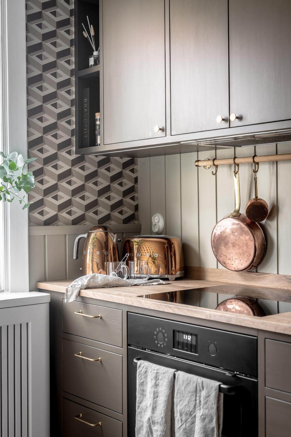 kitchen-detail-ikea-cabinets-brown-geometric-wallpaper-nordroom