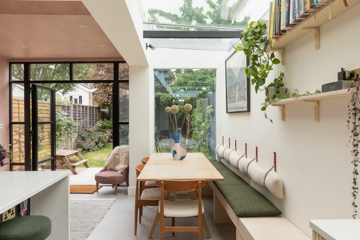 kitchen dining table with green bench and skylight nordroom