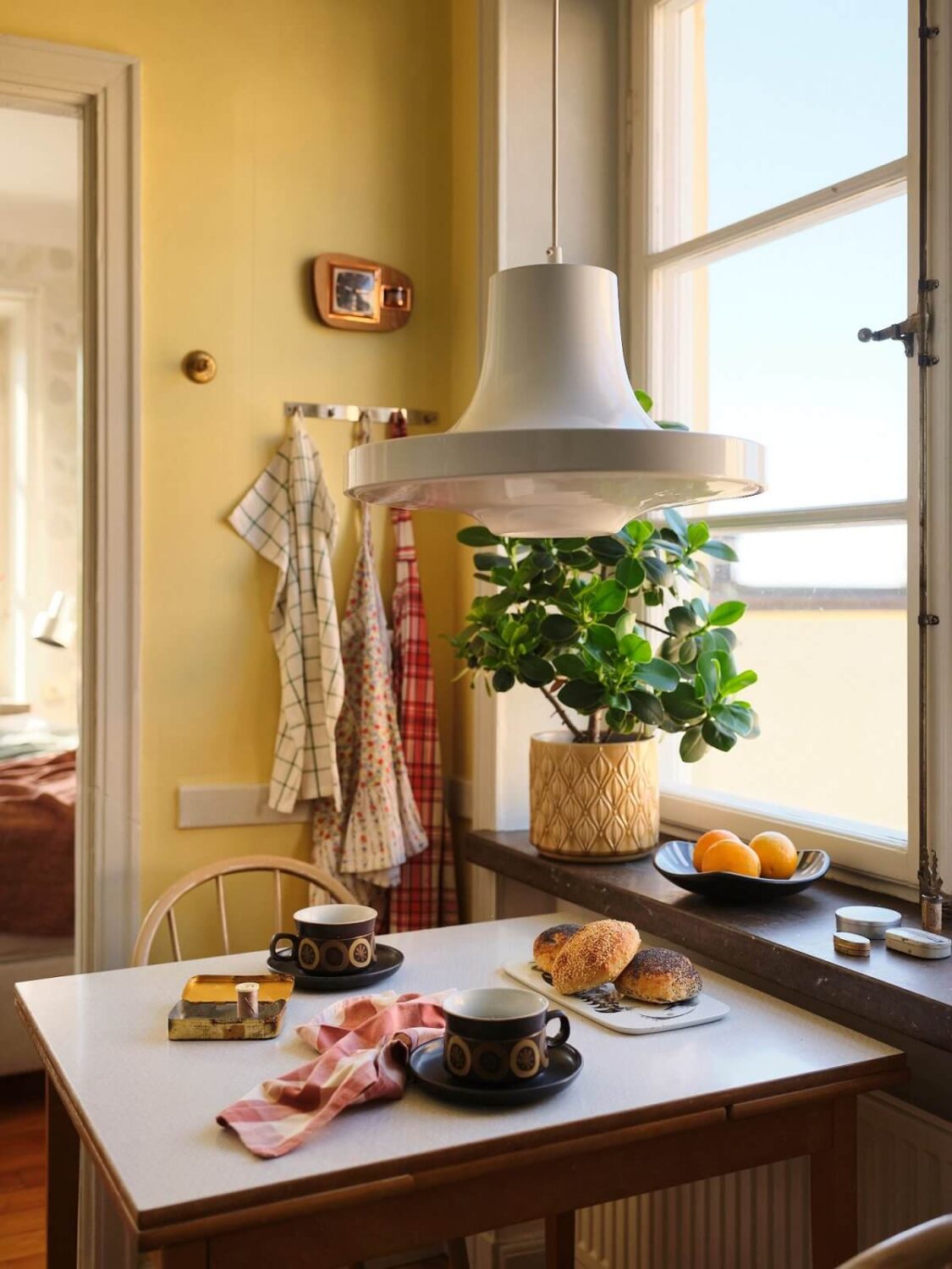 kitchen table with pale yellow wall