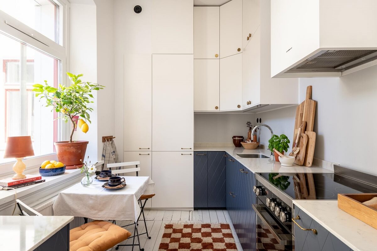 kitchen with blue and white cabinets