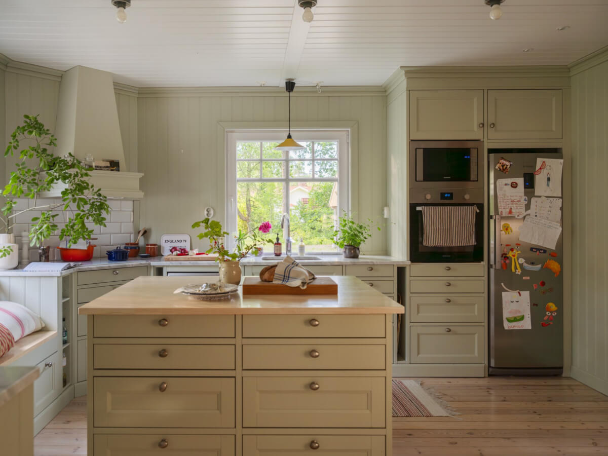 kitchen with small island and window bench