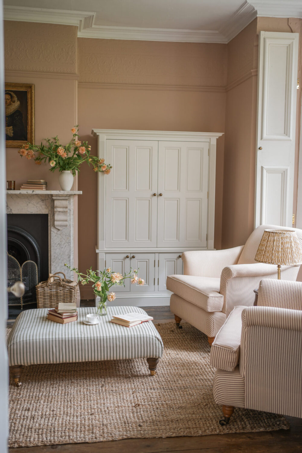 light brown living room with fireplace nordroom Pantone Color of the Year 2025: Mocha Mousse Interior Inspiration