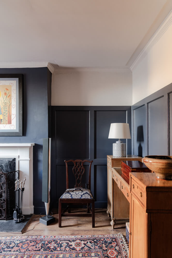 living room dark blue paneling