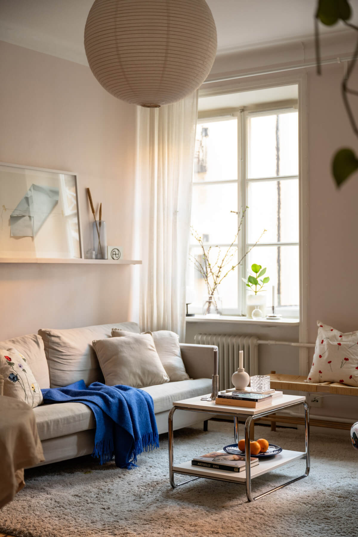 living room light pink walls large window