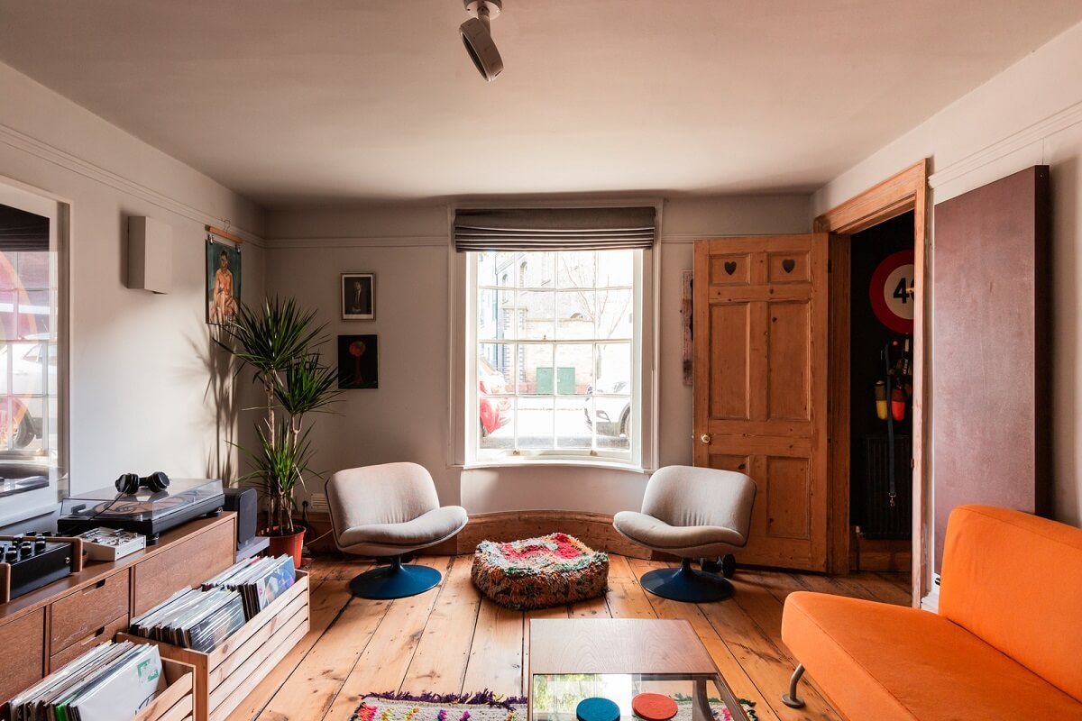 living room wooden floorboards music collection