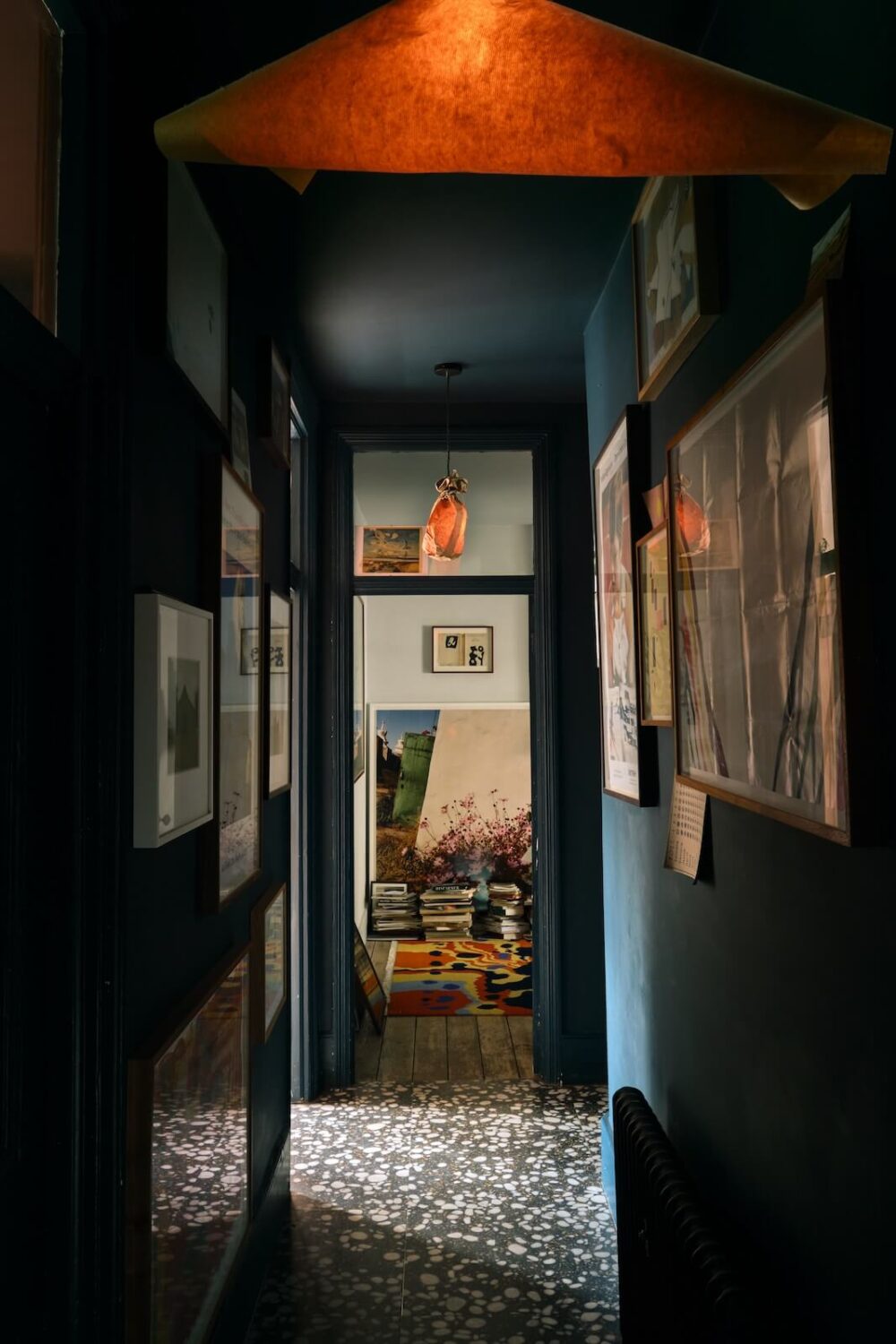 moody-deep-blue-hallway-terrazzo-floor-nordroom
