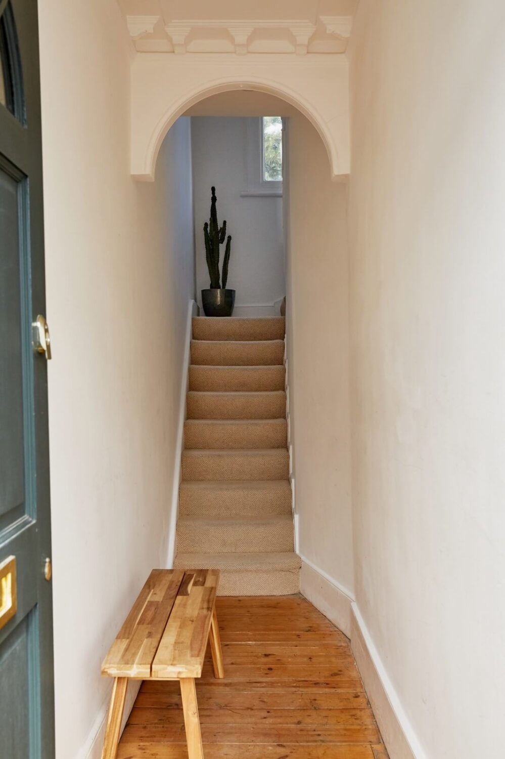 narrow-hallway-with-bench-staircase-nordroom