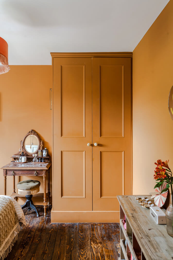 ochre bedroom built-in wardrobes