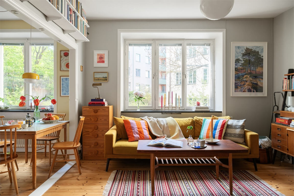 ochre sofa colorful decor charming studio apartment nordroom