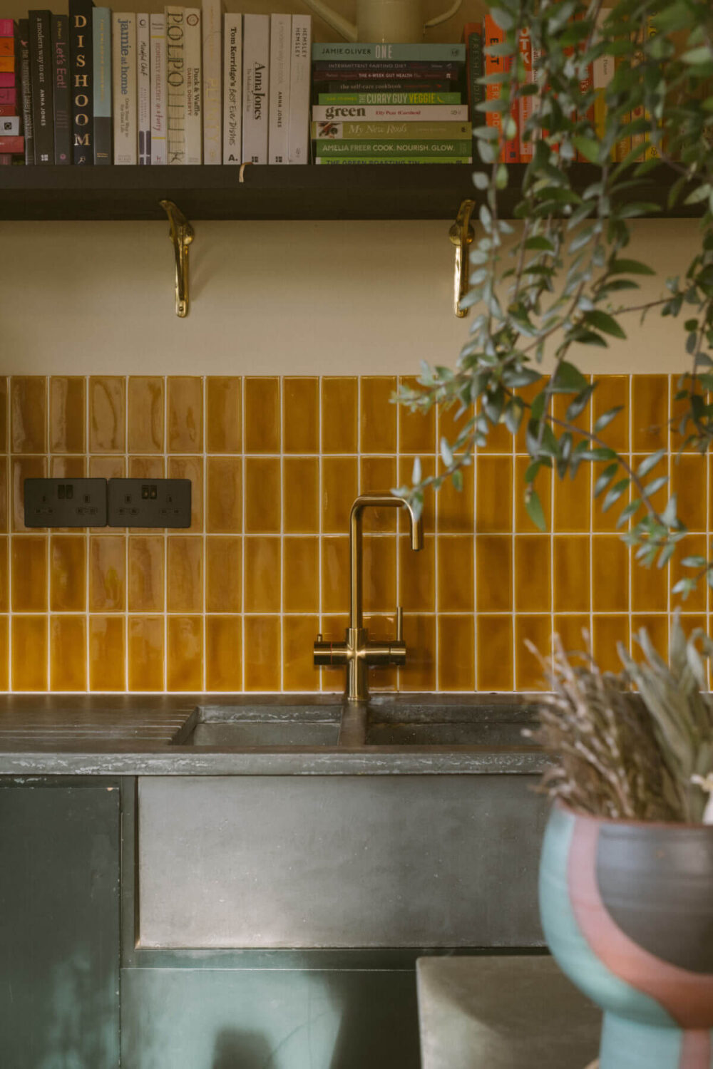 ochre-yellow-backsplash-tiles-kitchen-concrete-worktop-sink-nordroom