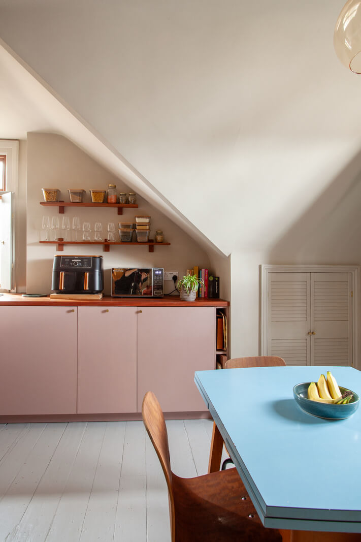 open-plan kitchen space slanted ceilings