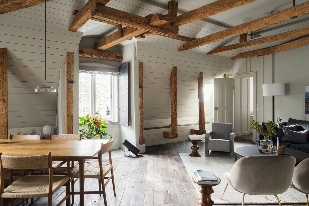 open plan living space exposed wooden beams