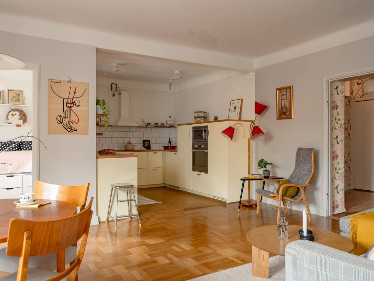 open plan living space yellow kitchen