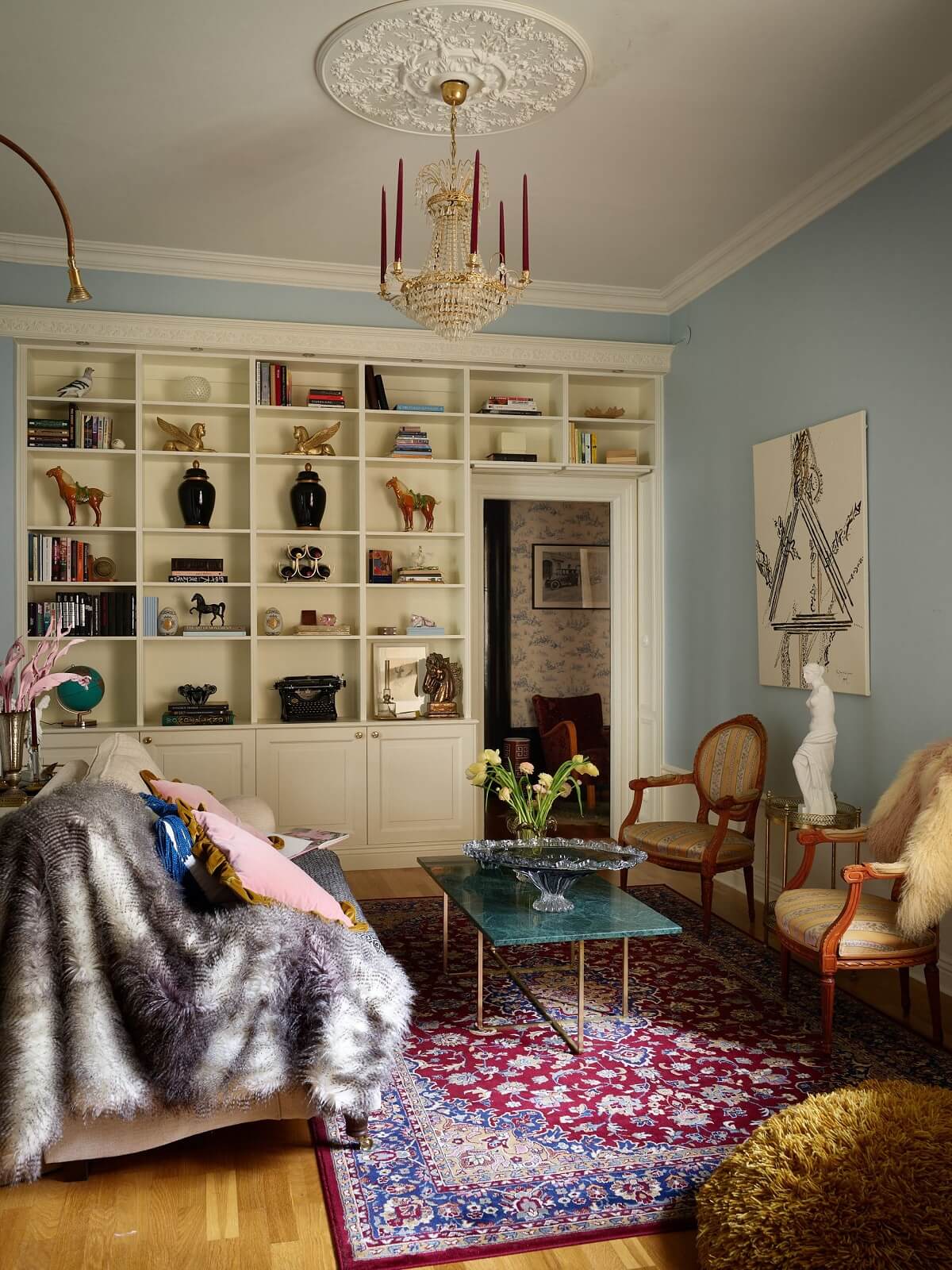 pastel-blue-walls-living-room-built-in-bookcases-nordroom