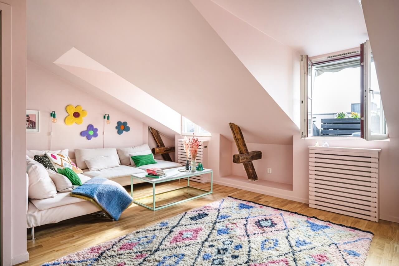 pink living room colorful rug