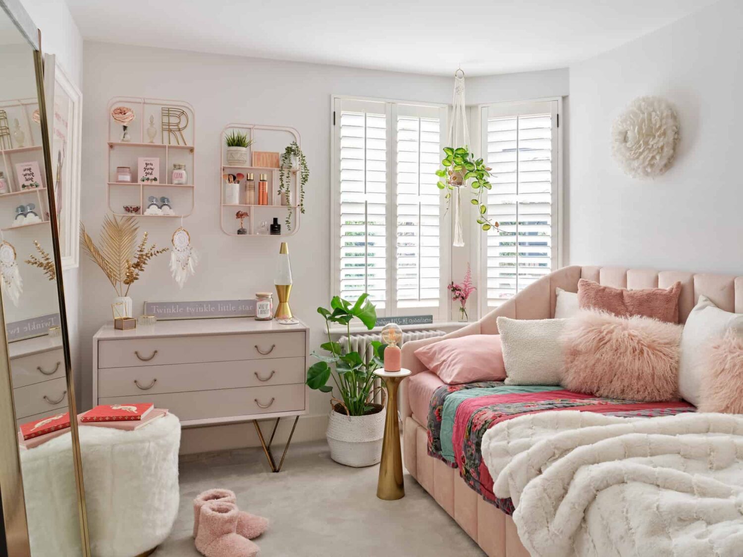 pink teenage girl bedroom with sofabed