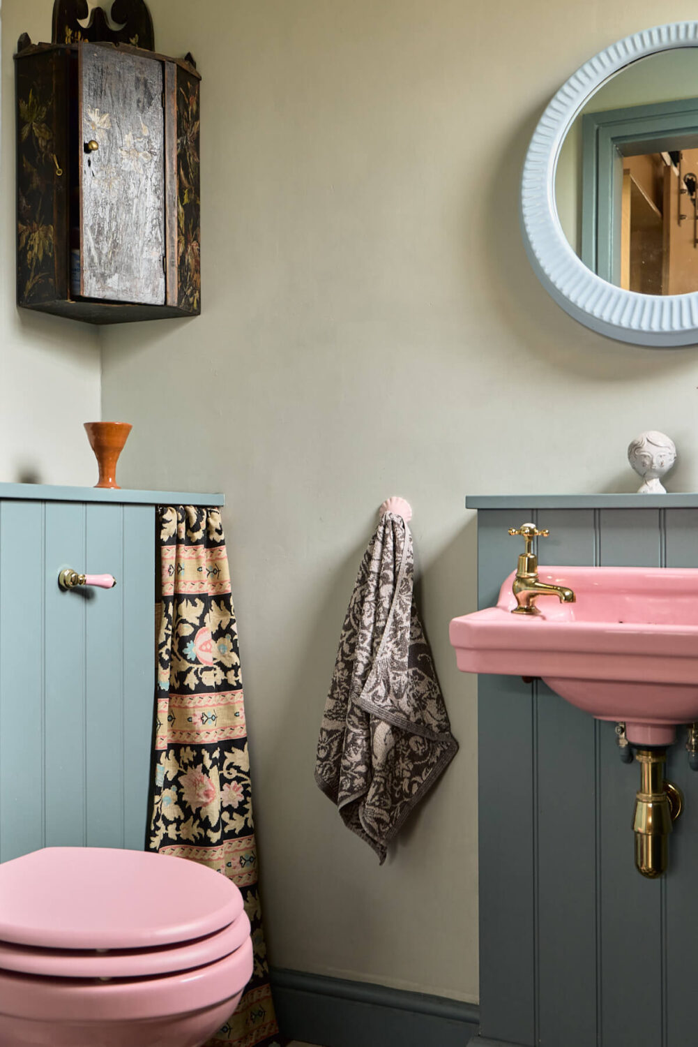 pink toilet and sink