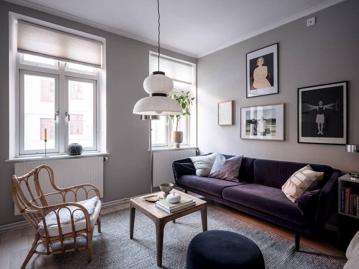 purple sofa light gray studio apartment nordroom